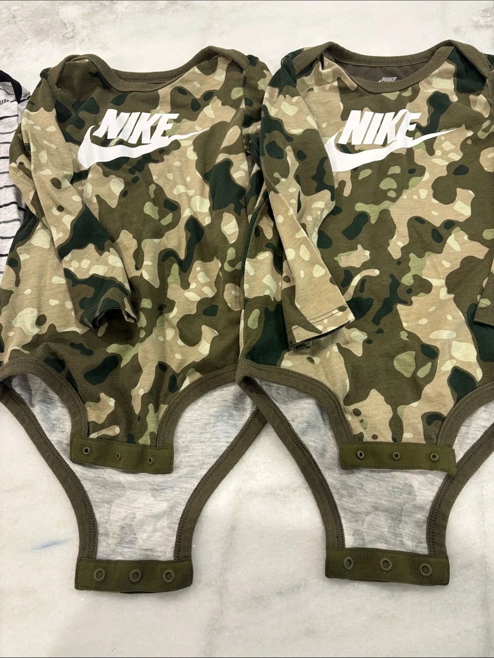 Baby boy Nike bodysuits